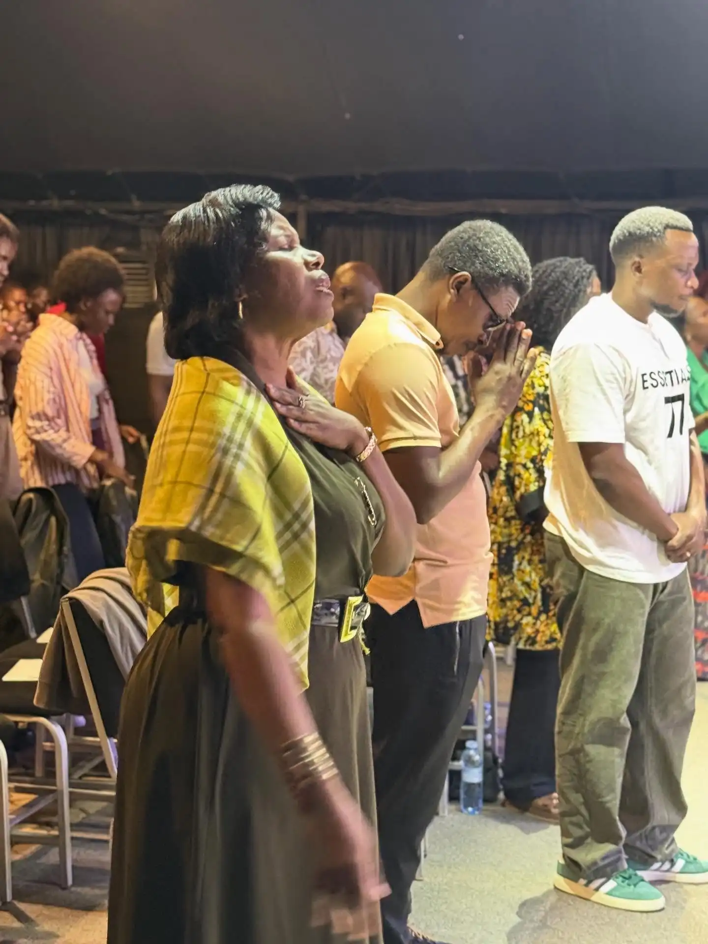 people praying c3 church kabalagala